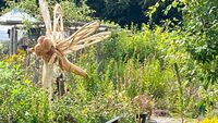 libelle houtsculptuur, kettingzaagkunst, teambuilding, familie uitje 